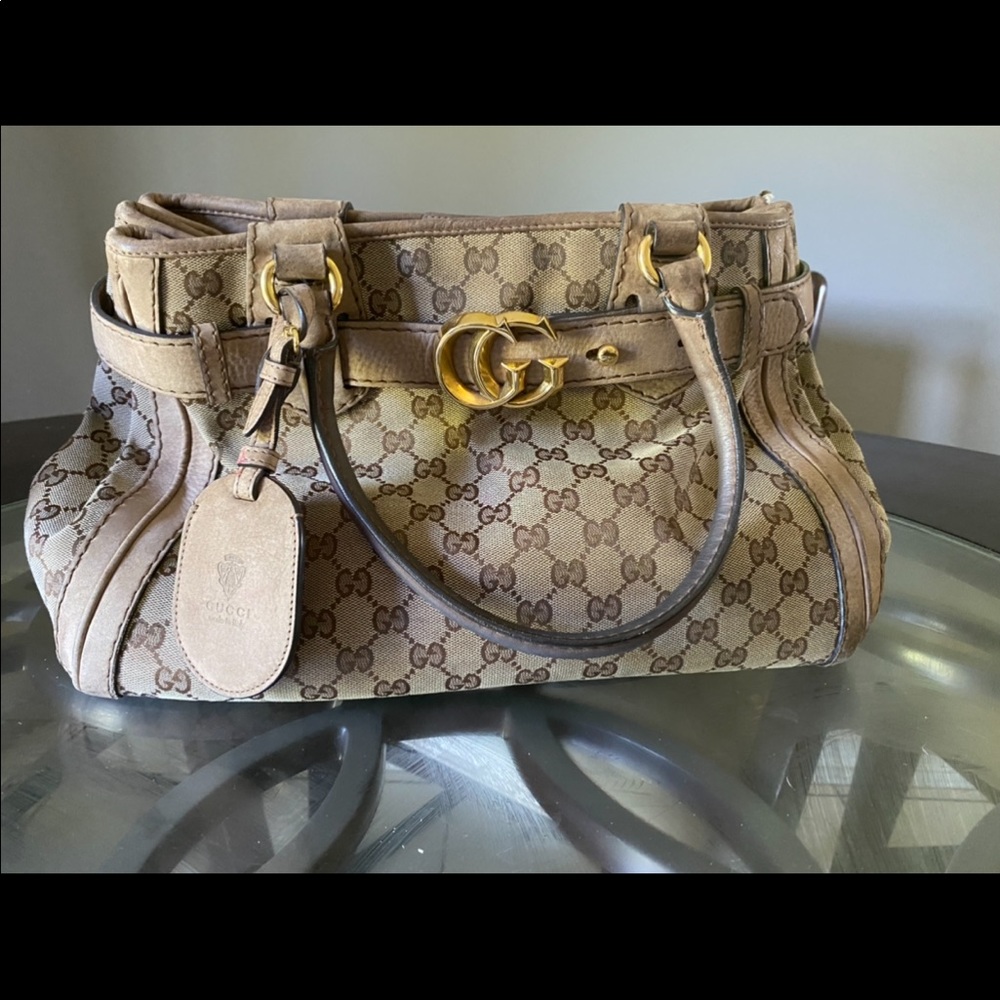 Gold Gucci purse
